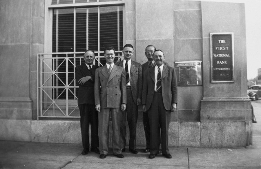 Laurence Burdette Flanders Jr. pictured in front of bank
